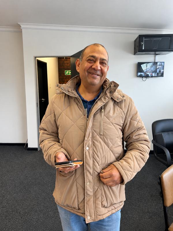 Kamlesh, the electrician behind Electrical Guru, smiling